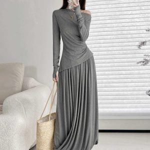 Elegant Women's Spring-Summer Outfit: Fitted Long-Sleeve T-Shirt with One-Word Collar and Pleated Skirt with Pocket