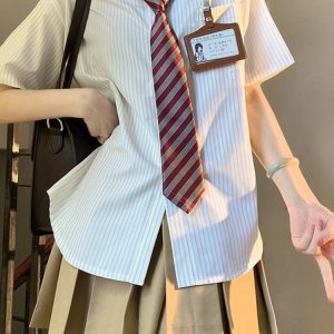 Four-Piece JK Uniform Set for Women: Striped Long Sleeve Shirt, Loose Fit, Pleated Skirt - Trendy 2024 Autumn Style