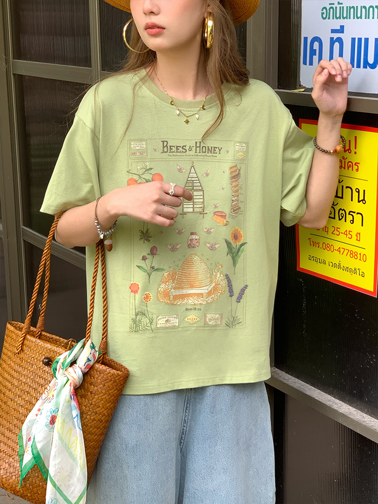 Green Retro Printed Short Sleeve T-Shirt for Women - Vintage Style Loose Drop Shoulder Top for Summer, 90s Inspired Green Retro Printed Short Sleeve T-Shirt for Women - Vintage Style Loose Drop Shoulder Top for Summer, 90s Inspired