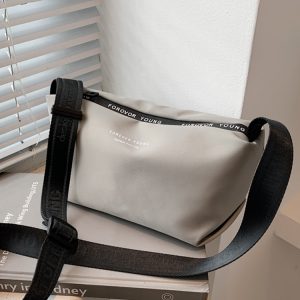 High-End Lightweight Nylon Crossbody Bag for Women - Portable Commuting Travel Style with Wide Strap