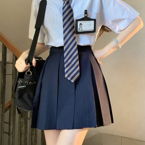 High-Waisted Pleated JK Uniform Skirt - Plaid and Solid Color Basic Style, Authentic Pudding Bear Inspired Design
