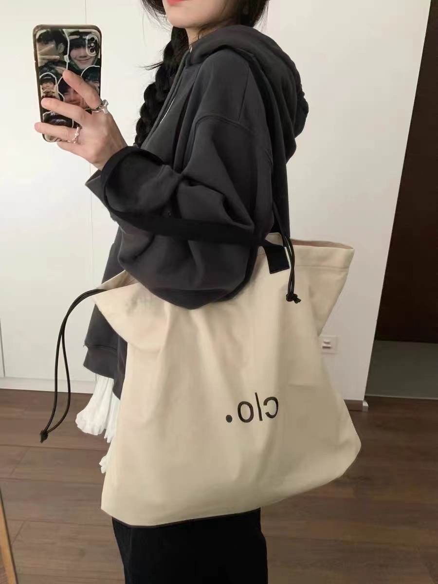 Large Capacity Canvas Drawstring Tote Bag for Commuting, Fresh Korean Style Minimalist Design with Letter Print Large Capacity Canvas Drawstring Tote Bag for Commuting, Fresh Korean Style Minimalist Design with Letter Print