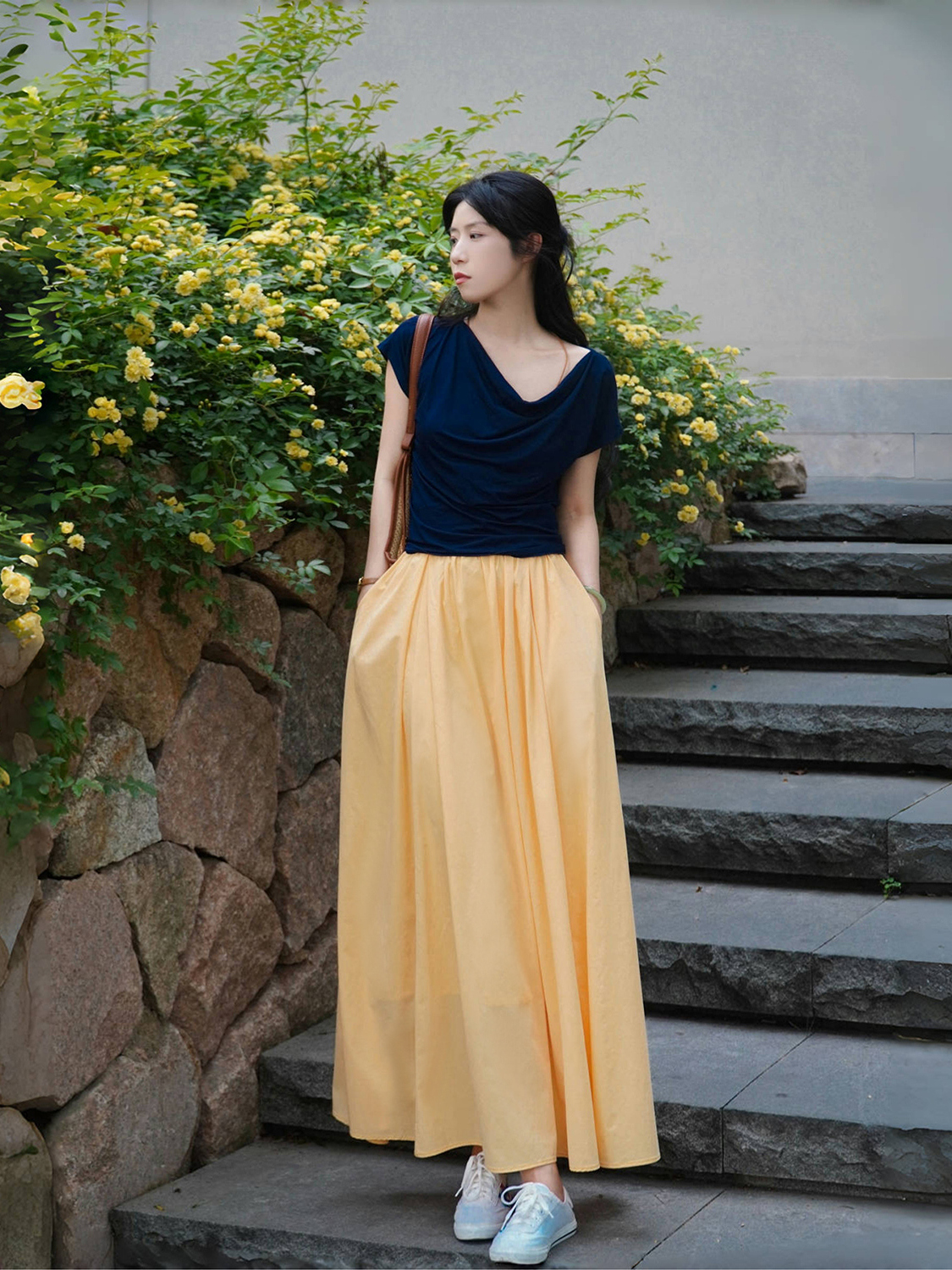 Light Yellow Pleated High-Waisted A-Line Long Skirt with Pockets, Zipper, Casual Parachute Style for a Slimming Effect Light Yellow Pleated High-Waisted A-Line Long Skirt with Pockets, Zipper, Casual Parachute Style for a Slimming Effect
