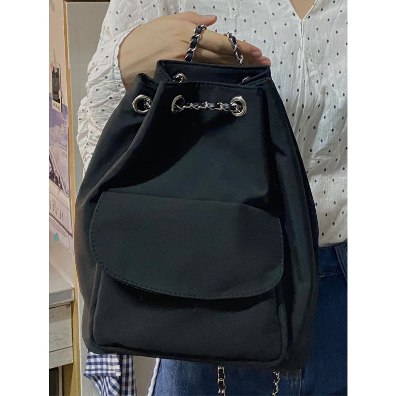 Lightweight Minimalist Black Drawstring Backpack for Women - Stylish High-End Summer Commuting Bag with Chain Detail