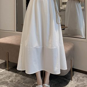 Mid-Length A-Line Umbrella Skirt with Flower Bud Patchwork, High-Waisted Black and White Hepburn Style for Spring and Summer