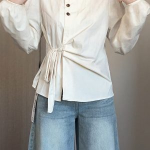 Plus-Size Women's Long Sleeve Shirt - French Design, Irregular Waist, Flattering Spring Top for Curvy Figures, Chic Fashion.