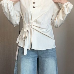 Plus-Size Women's Long Sleeve Shirt - French Design, Irregular Waist, Flattering Spring Top for Curvy Figures, Chic Fashion.