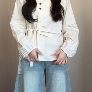 Plus-Size Women's Long Sleeve Shirt - French Design, Irregular Waist, Flattering Spring Top for Curvy Figures, Chic Fashion.