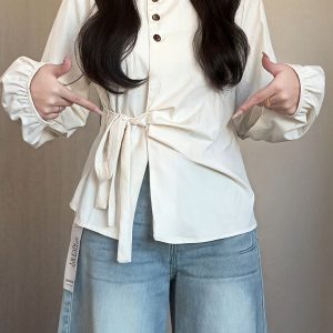 Plus-Size Women's Long Sleeve Shirt - French Design, Irregular Waist, Flattering Spring Top for Curvy Figures, Chic Fashion.