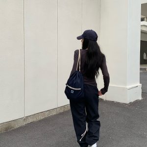 Rebellious Aesthetics Slanted Buckle Design Tencel Tee - Nonconformist Style, 90s Inspired Fashion Top