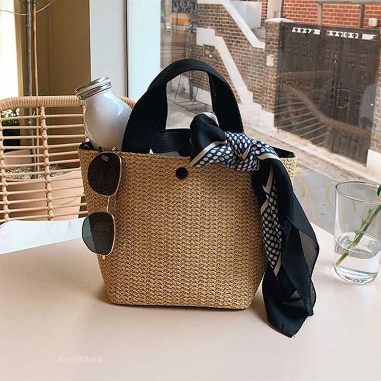 Trendy Handheld Straw Woven Bag for Women - 2023 Retro Beach Vacation Style, Perfect for Summer Outings and Instagram Looks Trendy Handheld Straw Woven Bag for Women - 2023 Retro Beach Vacation Style, Perfect for Summer Outings and Instagram Looks
