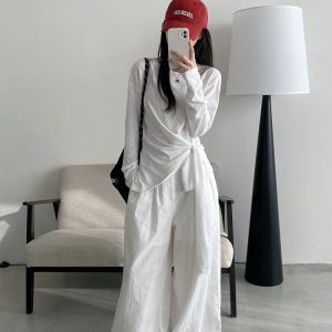 Women's Korean Style Long Sleeve T-Shirt - White Base Layer, Loose Fit, Straight Shoulder, Unique Design, High-End Fashion