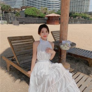 Yellow Backless Beach Vacation Dress, Slimming Long Skirt, French Design, Perfect for Sanya Travel and Summer Getaways